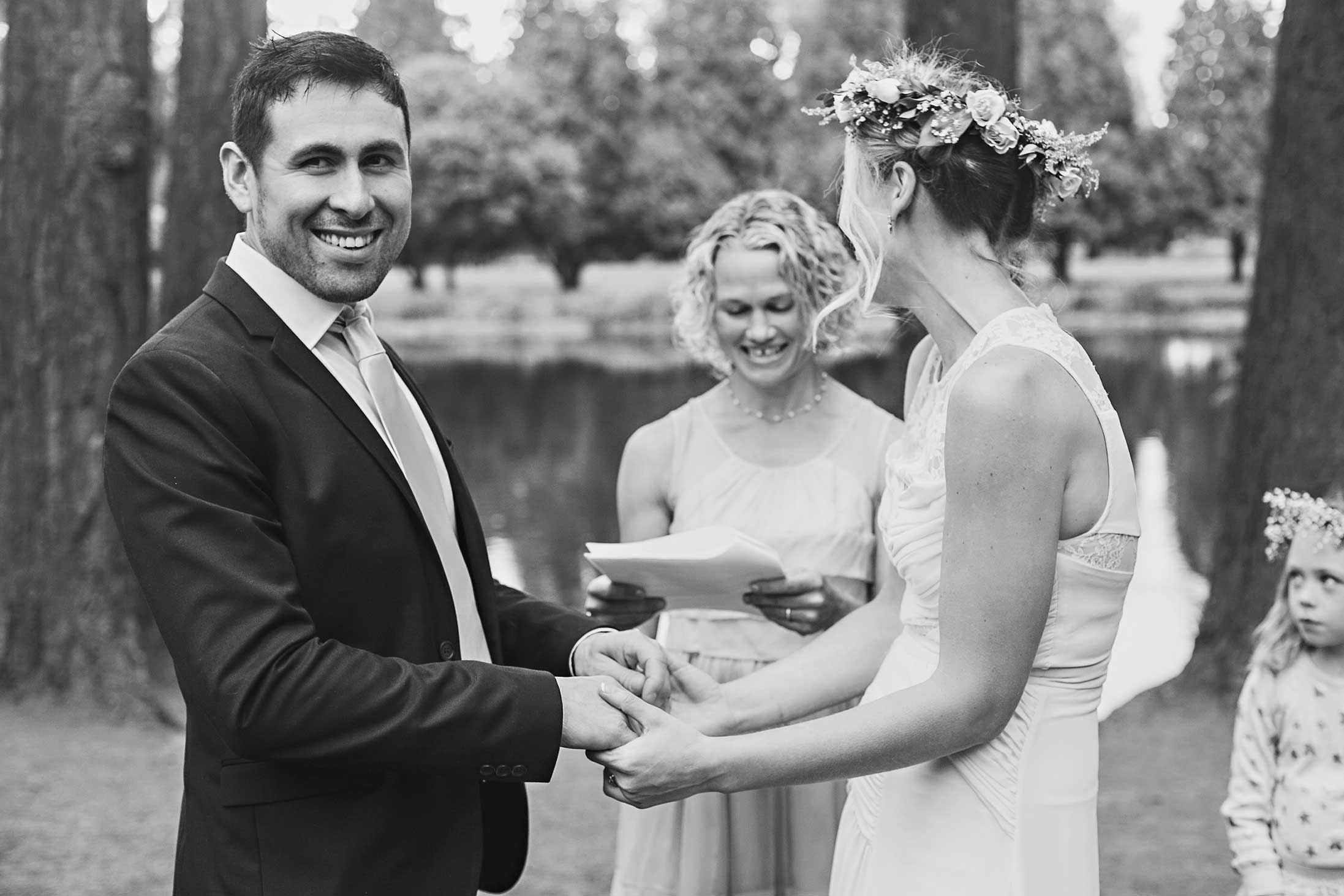 black-and-white-garden-wedding-groom-happy
